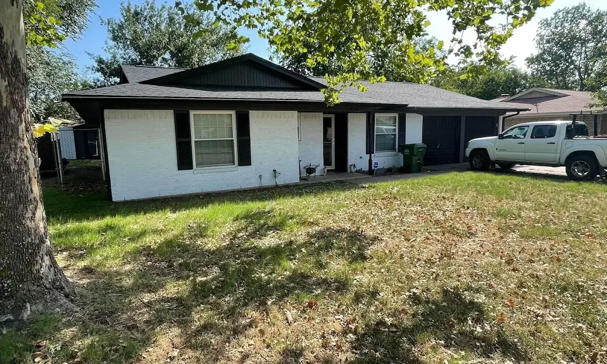 Professional roofing crew working on a residential roof in Hobart